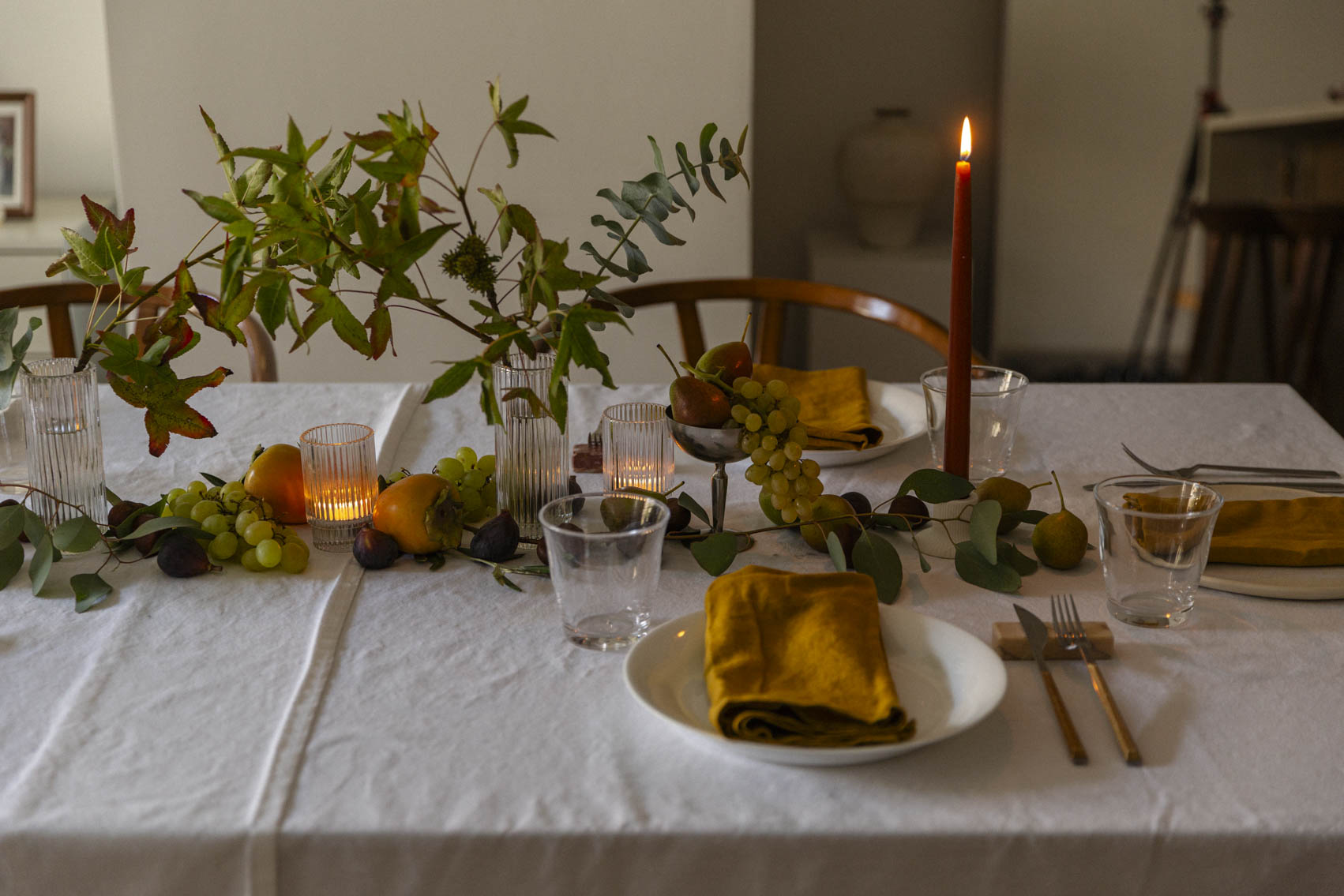 A Fall Tablescape Decorated with Fruits