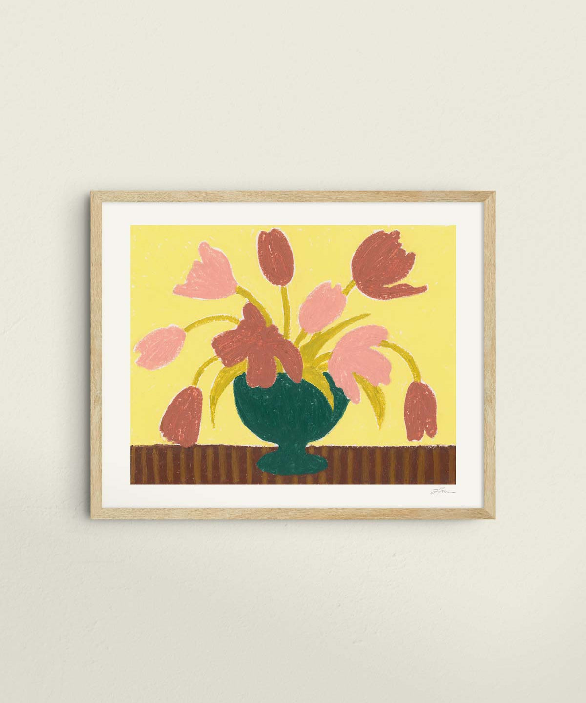 Framed artwork of pink tulips in a green vase on a butter yellow background.